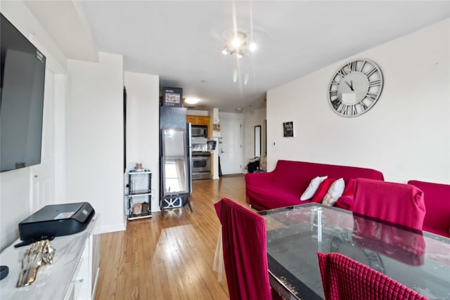 living room with light hardwood / wood-style floors