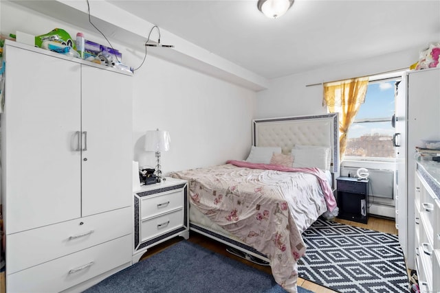 bedroom featuring dark wood-type flooring