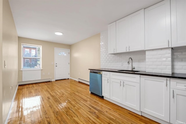 kitchen with sink, stainless steel dishwasher, light wood-type flooring, baseboard heating, and white cabinetry