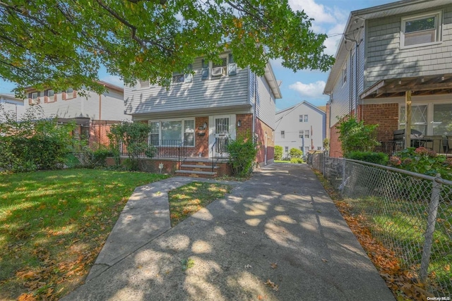 view of front of home with a front yard