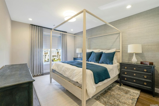 bedroom featuring hardwood / wood-style floors