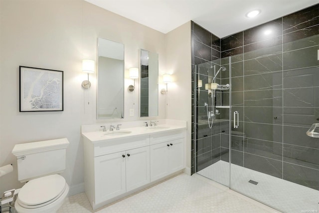 bathroom featuring vanity, toilet, and walk in shower