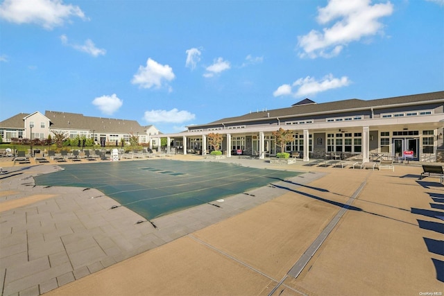 view of pool featuring a patio