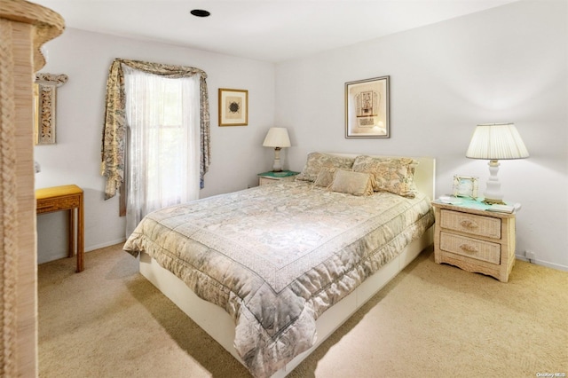 bedroom with light colored carpet