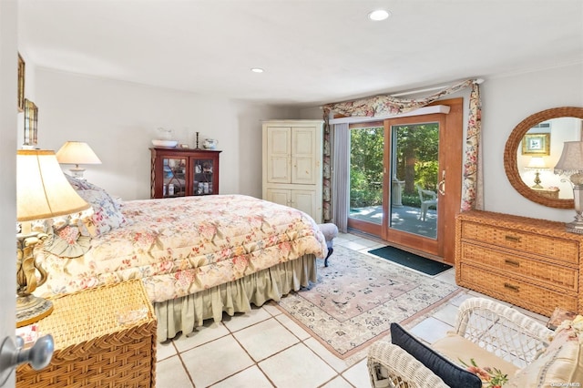 bedroom featuring access to exterior and light tile patterned floors