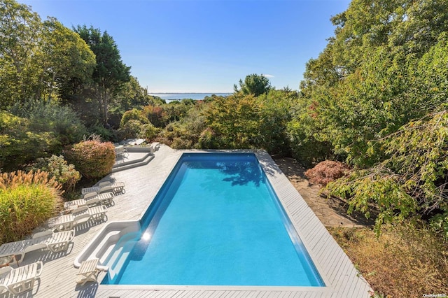 view of pool featuring a patio