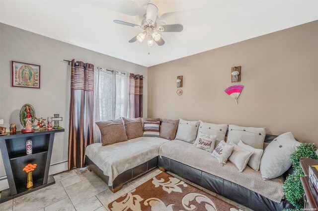 living room featuring ceiling fan and a baseboard radiator