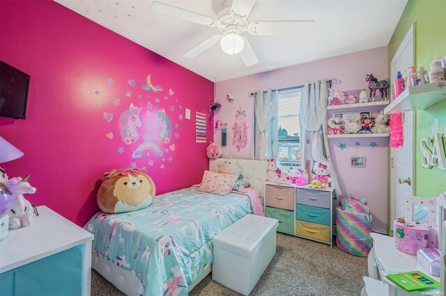 carpeted bedroom with ceiling fan