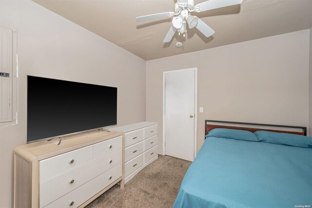 carpeted bedroom featuring ceiling fan