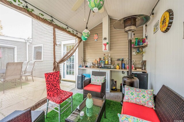 view of patio / terrace featuring ceiling fan