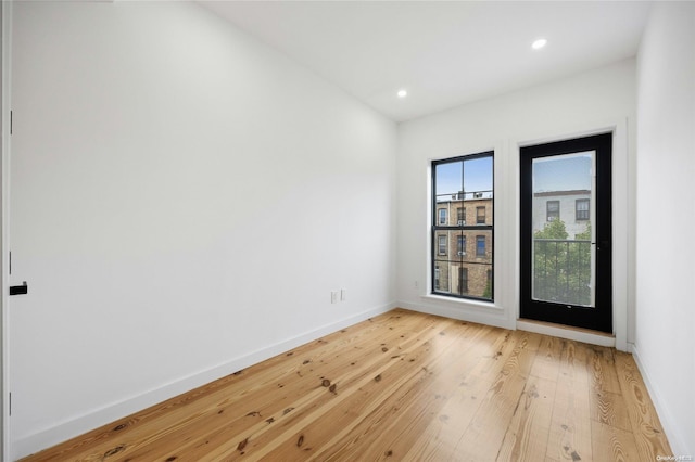 583 Putnam Ave Unit 4, Brooklyn, NY 11221 - unfurnished room with light wood-style flooring, baseboards, and recessed lighting