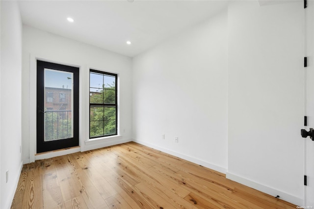 583 Putnam Ave Unit 4, Brooklyn, NY 11221 - empty room with light wood-style floors, baseboards, and recessed lighting