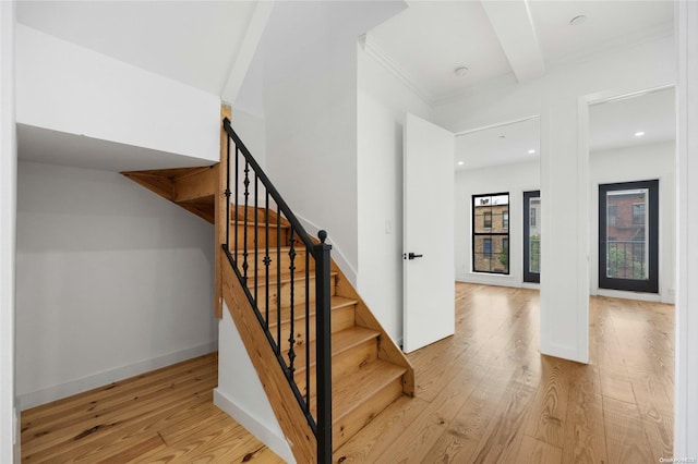 583 Putnam Ave Unit 4, Brooklyn, NY 11221 - staircase with wood finished floors, ornamental molding, recessed lighting, and baseboards