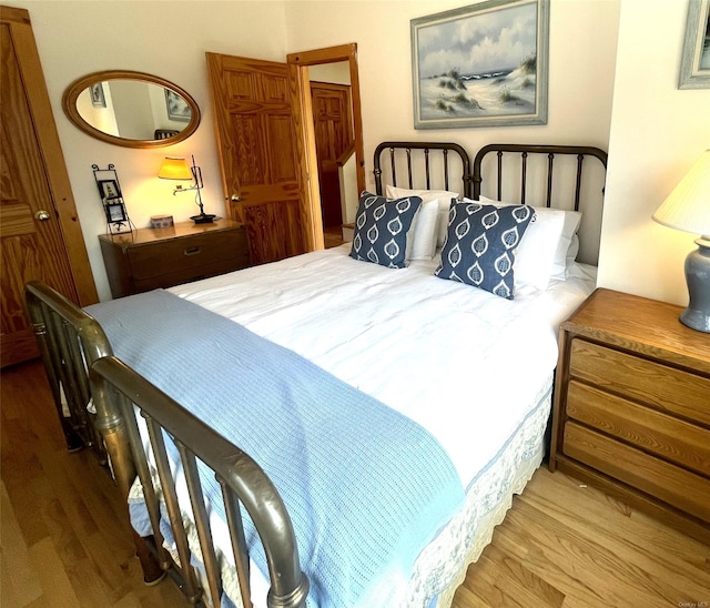25 Oceanview Dr, Southampton, NY 11968 - bedroom featuring wood finished floors