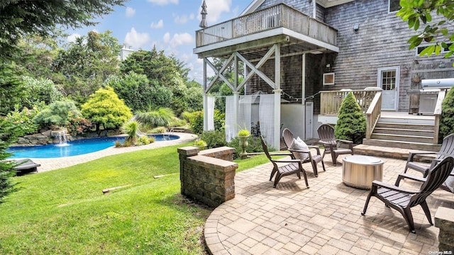25 Oceanview Dr, Southampton, NY 11968 - view of patio with a wooden deck and an outdoor pool