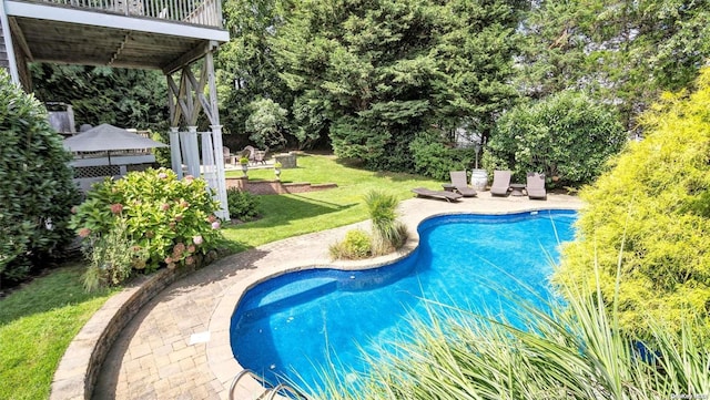 25 Oceanview Dr, Southampton, NY 11968 - outdoor pool with a lawn, a patio, and a wooden deck