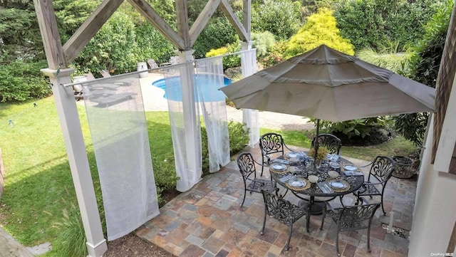 25 Oceanview Dr, Southampton, NY 11968 - view of patio / terrace with outdoor dining area and a fenced in pool