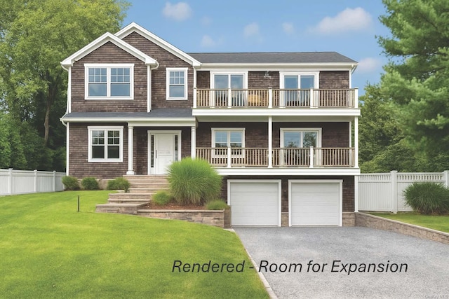 25 Oceanview Dr, Southampton, NY 11968 - view of front facade with a balcony, an attached garage, and driveway