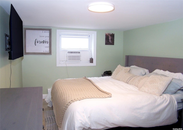 bedroom featuring cooling unit