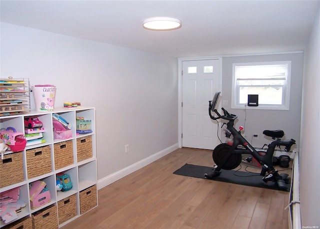 exercise area with hardwood / wood-style floors