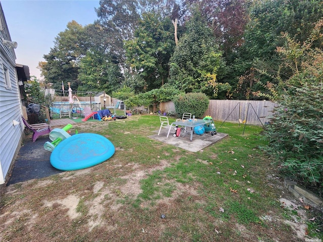 view of yard with a playground