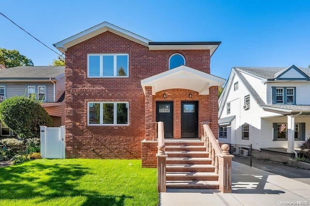 view of front of home featuring a front lawn