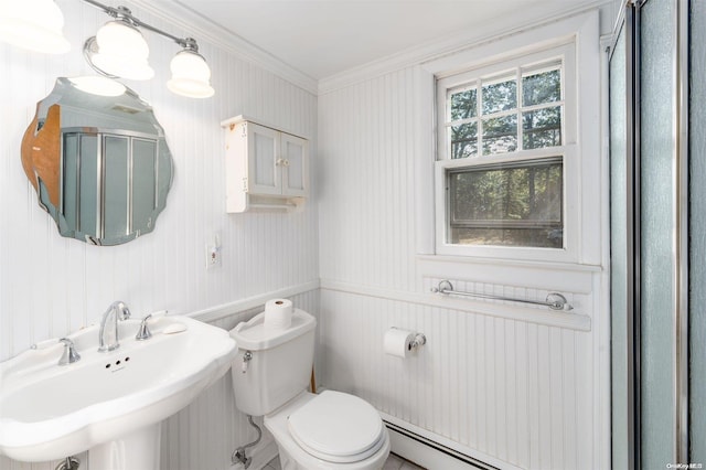 bathroom featuring toilet, ornamental molding, sink, and a baseboard radiator