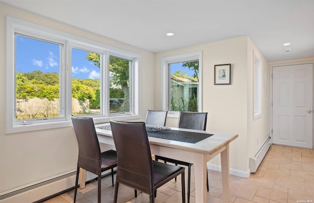 dining area featuring baseboard heating