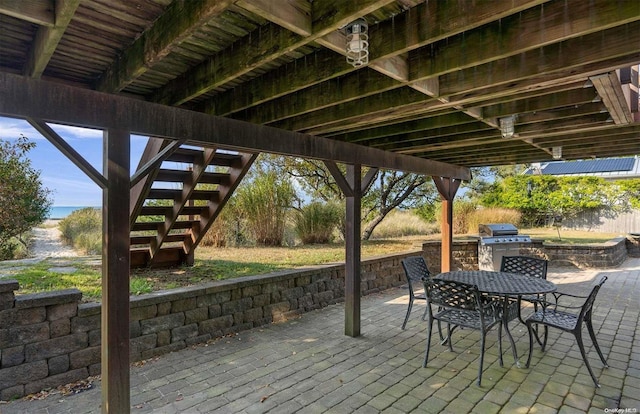 view of patio / terrace with exterior kitchen and grilling area