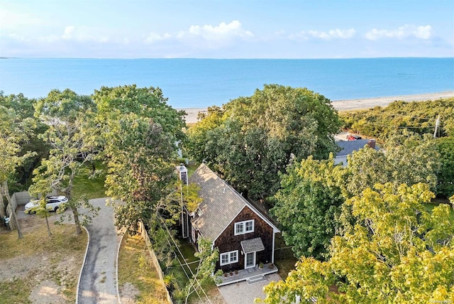 drone / aerial view with a view of the beach and a water view