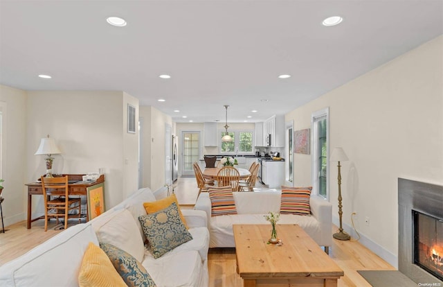 living room featuring light wood-type flooring