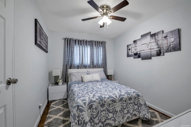 bedroom featuring hardwood / wood-style floors and ceiling fan