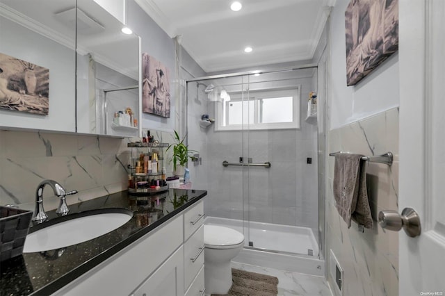 bathroom with vanity, a shower with door, crown molding, decorative backsplash, and toilet