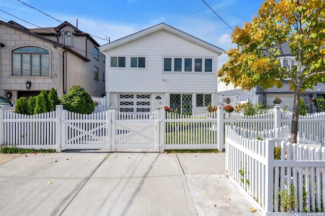 160-28 87th St, Howard Beach, NY 11414 - view of front of property with a fenced front yard and a gate