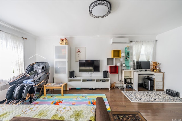 living room featuring dark hardwood / wood-style flooring, a wall mounted AC, and crown molding