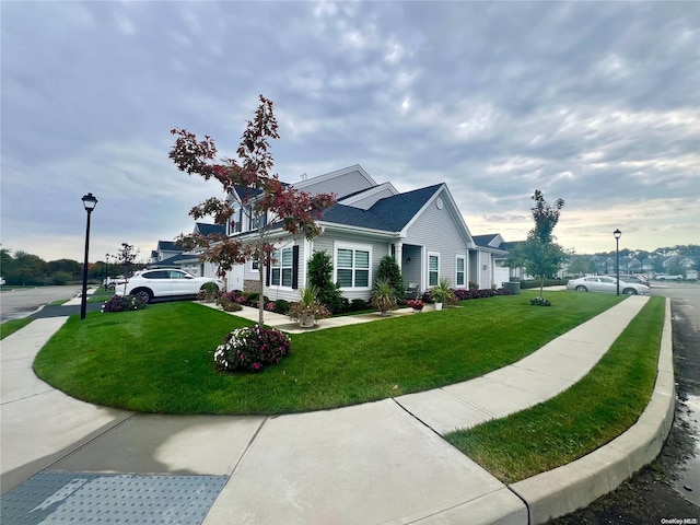 view of front of home with a front yard