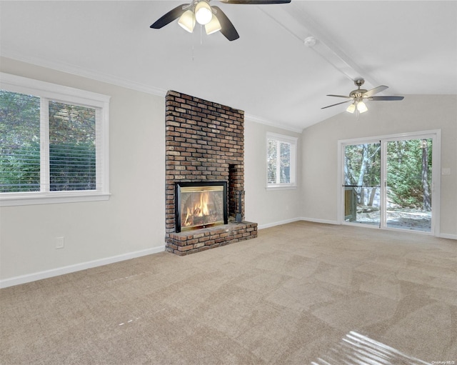 unfurnished living room featuring lofted ceiling with beams, a fireplace, ceiling fan, and light colored carpet