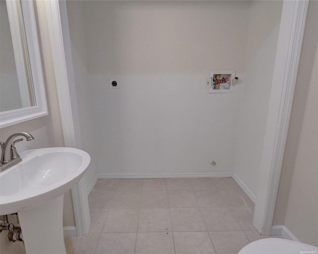 bathroom featuring tile patterned floors and sink