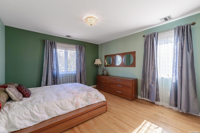 bedroom featuring light wood-type flooring