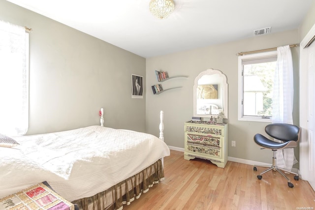 bedroom featuring light wood-type flooring