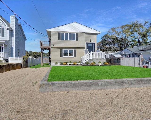 view of property featuring a front yard