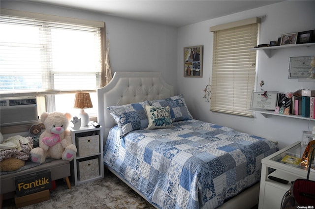 carpeted bedroom featuring cooling unit