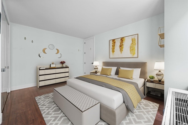 bedroom featuring dark wood-type flooring