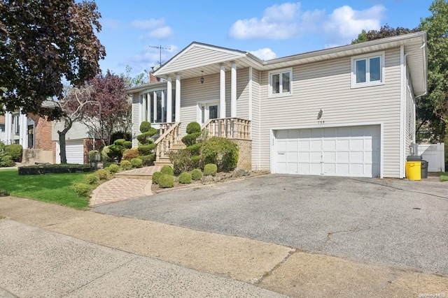 split foyer home featuring a garage