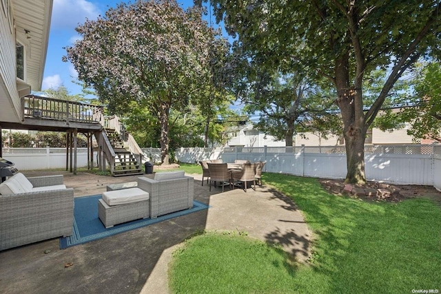 view of patio featuring an outdoor living space and a deck