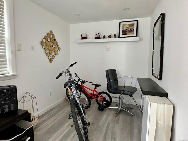 office space with light hardwood / wood-style flooring