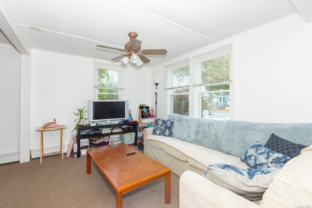 carpeted living room featuring plenty of natural light and ceiling fan