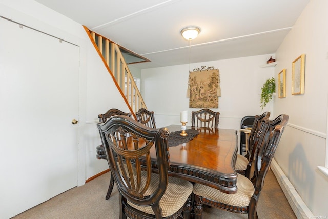 view of carpeted dining space