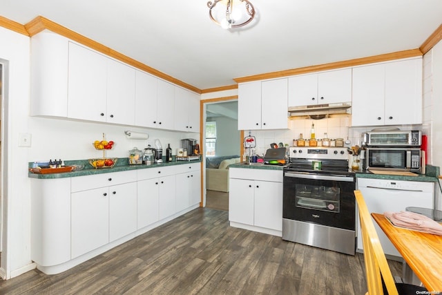 kitchen with stainless steel appliances, white cabinetry, dark wood-type flooring, and crown molding