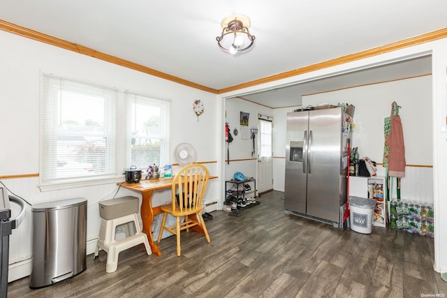 interior space with dark hardwood / wood-style flooring and ornamental molding